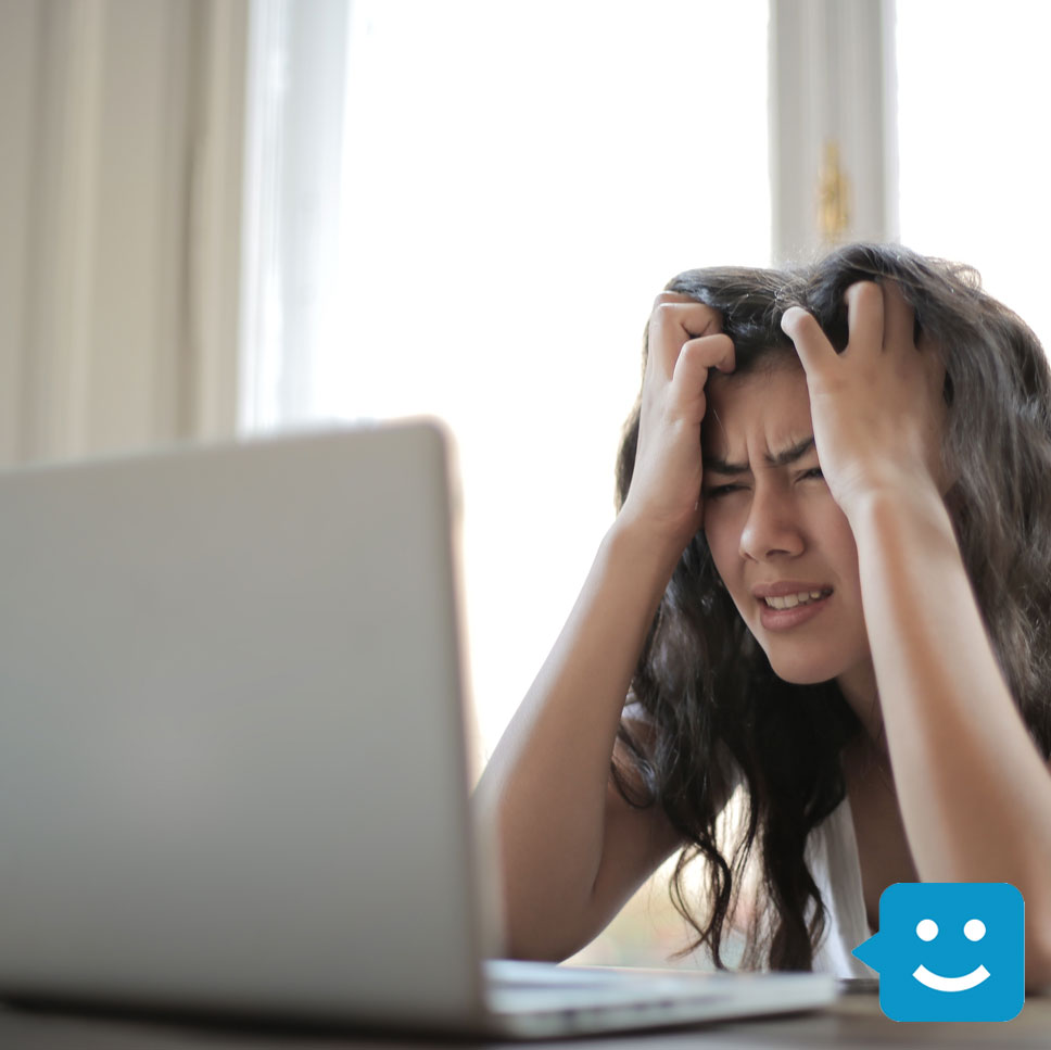 girl stressed looking at computer screen